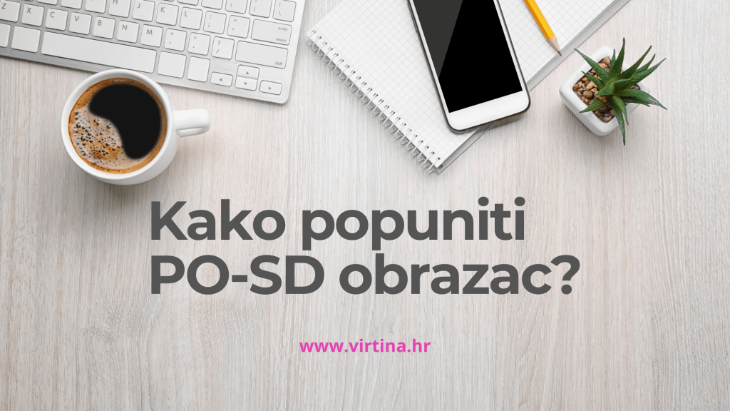 Radna površina na kojoj se vidi tipkovnica laptopa, blok za bilješke, mobitel, olovka, šalica s kavom i mala vaza sa zelenom biljkom